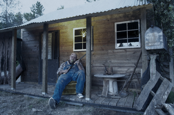 Hillbilly on porch